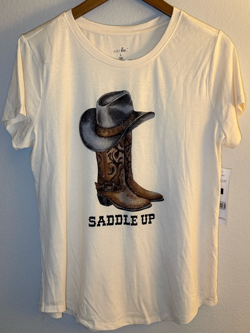 just be Cream Graphic Tee with Brown Cowboy Boot and Gray Hat